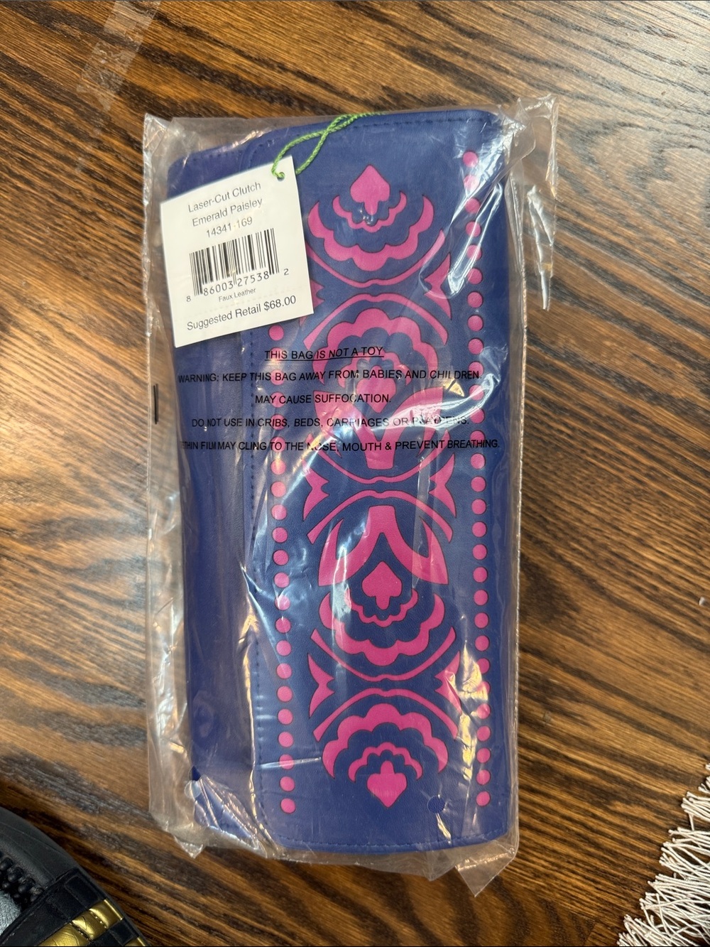 Laser-Cut Clutch with Pink Paisley Design on Deep Blue
